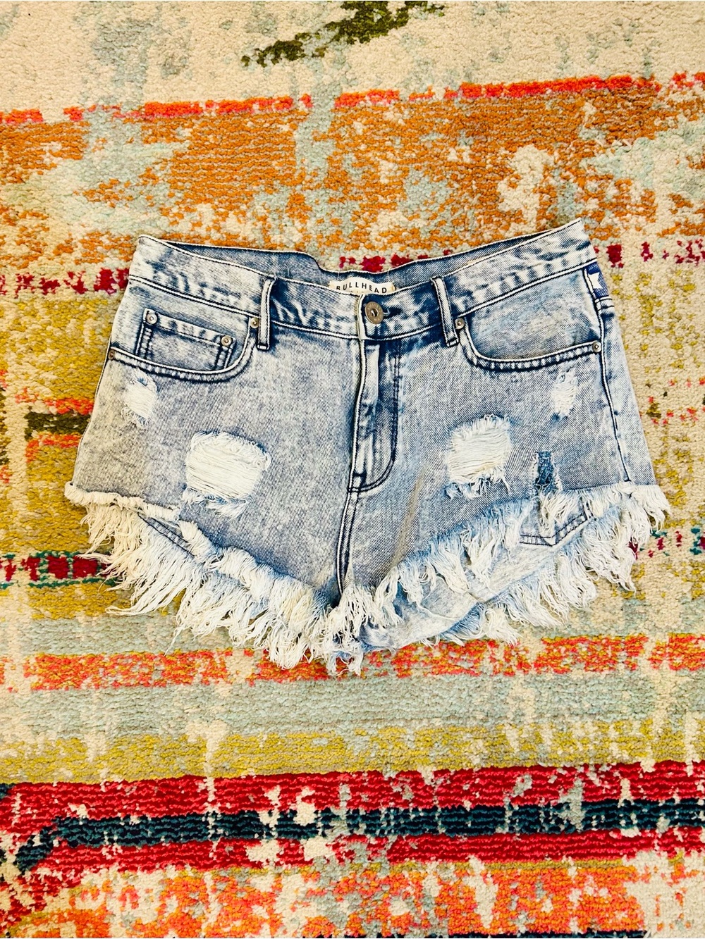 Bullhead Denim Co. Light Wash Distressed Denim Fringe Hem Women's Shorts
